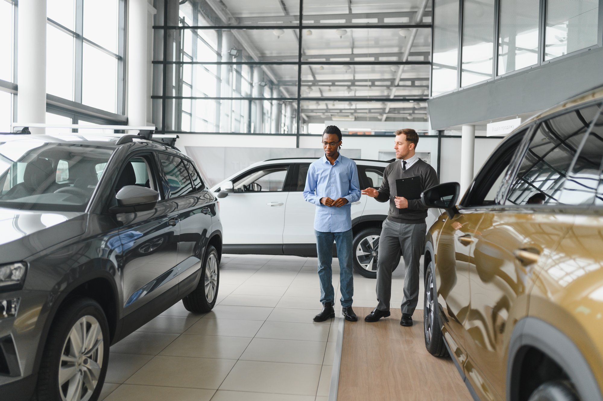 portrait-of-male-client-talking-to-professional-ca-2025-04-09-16-39-12-utc